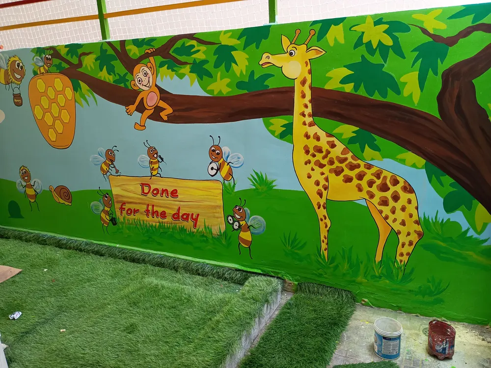 Hand-painted classroom mural by Vamshi Arts